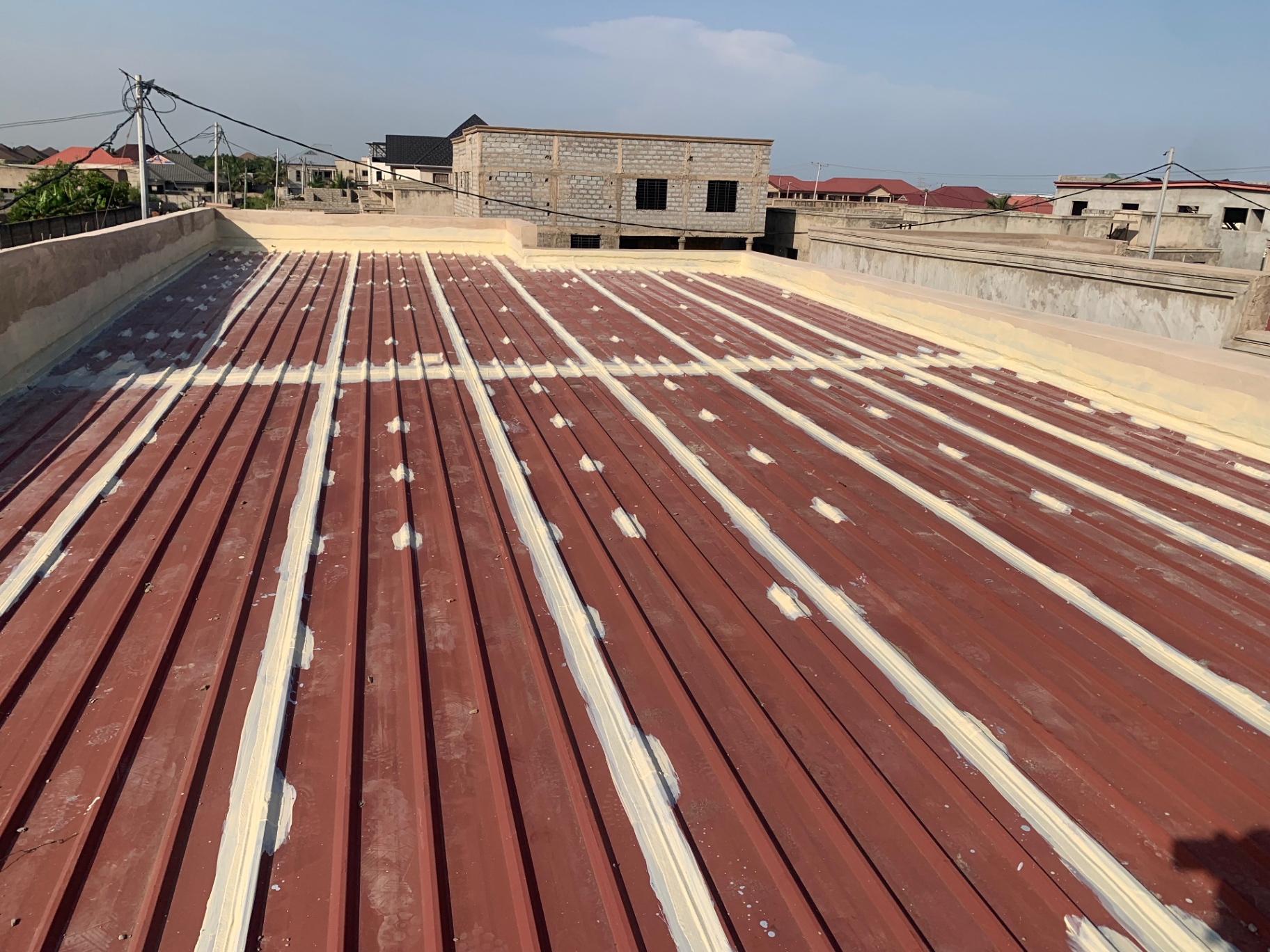 Metal roof seam sealing and waterproofing application