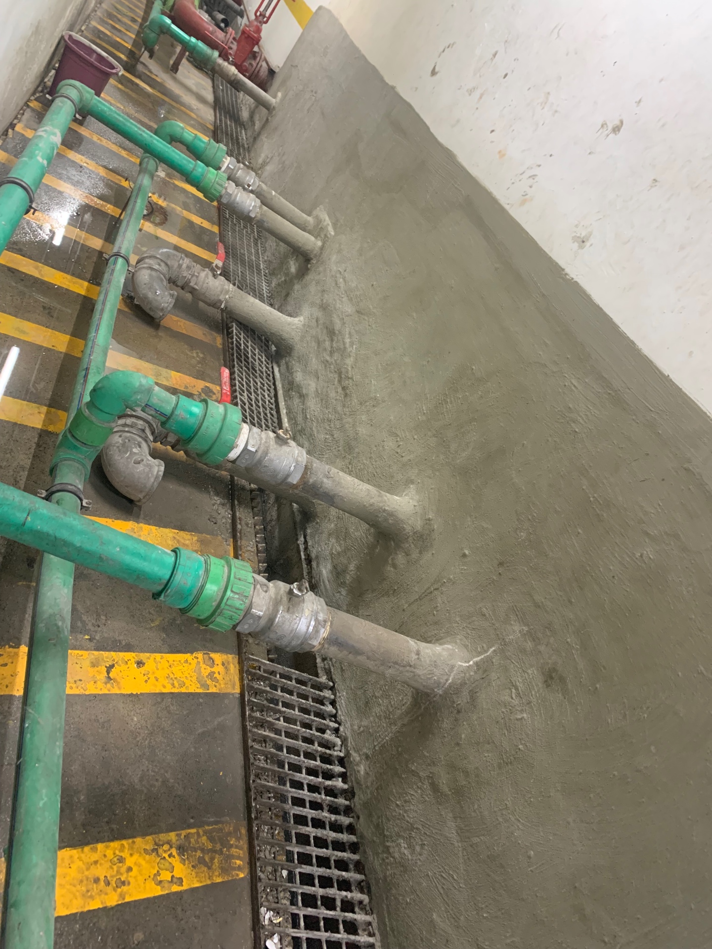 Basement wall waterproofing and tanking around service pipes